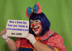 dress in clown and pose with sign small2