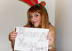 take a photo of a Christmas message etc on my face or on sign with reindeer antlers on small2