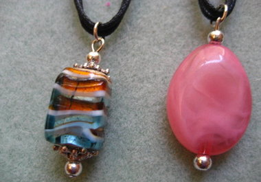 send you one beaded pendant on double strand black cord to US address only big2