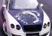 photoshop 2 of your pictures onto the hood of a white Bentley small2