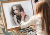 make your any photo appear as a girl is painting it with water colors in a street small2