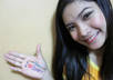 take 3 pictures of me advertising your message, fansign, website and anything you like small3