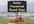 create a picture for you of a Solar LED Generator with a message of your choice placed on the sign