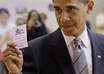 design a photo obama holding a tshirt with your photo and name