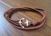 make you a handmade nautical bracelet with a silver anchor and leather strap