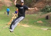 walk across a slackline and do tricks while saying your message to the camera small1