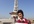 hold a promotional/valentine message/note in front of historical places of Lahore