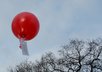 write a message on a tag on a latex helium filled balloon and release it, with photographic evidence which I will send to you small1