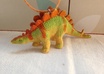 create a toy dinosaur necklace on a 18 inch cotton cord