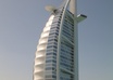 hold your sign in front of Burj Al Arab