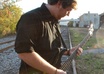play the Seinfeld theme song on bass in my yard