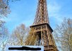 hold up a sign by the Eiffel Tower of anything you want to say and take a picture of it