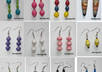 send you a pair of fairtrade earrings handmade from  recycled magazine paper beads by Ugandan women small1