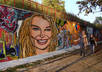 make 2 of your photos look like they were spray painted in graffiti on a wall small1