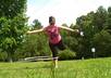 create a 30 second video of me hula hooping with your message or website name