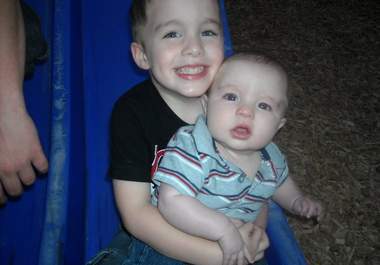 make my cute babies hold a sign with your message big1