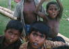 arrange a photo shoot with holding your massage by some slum children